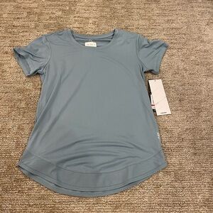 Head, small, blue athletic shirt